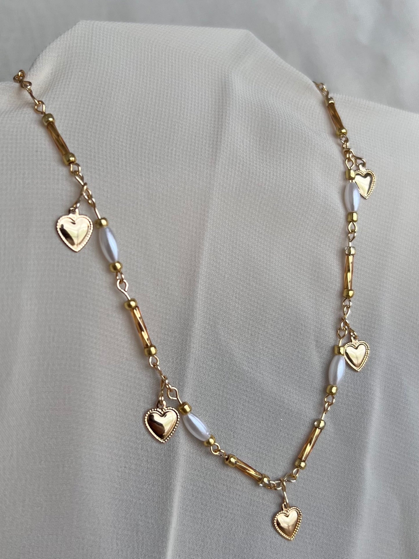 gold color pearl heart charm necklace
